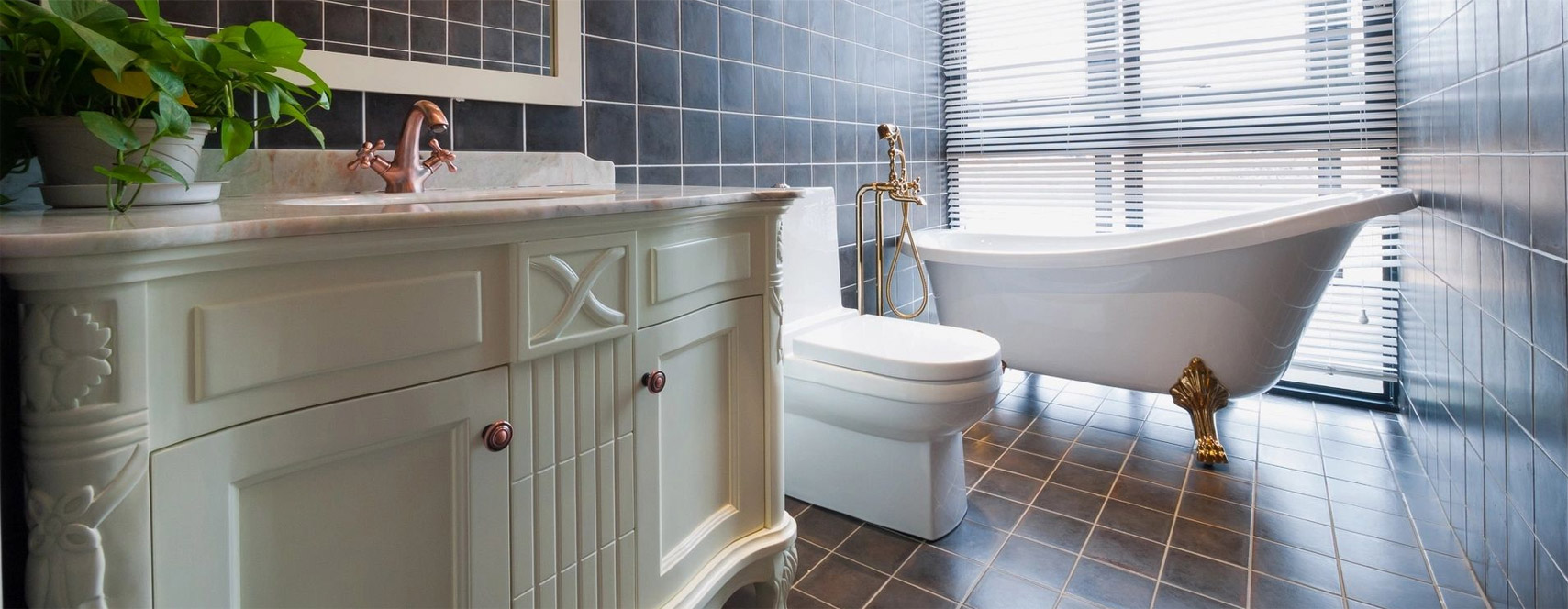 A bathroom with a toilet and tub in it