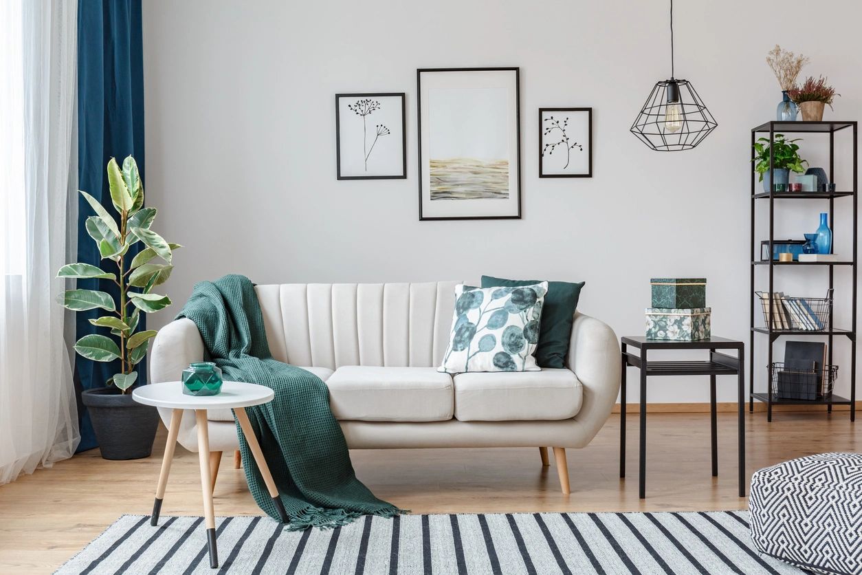 A living room with a couch and table