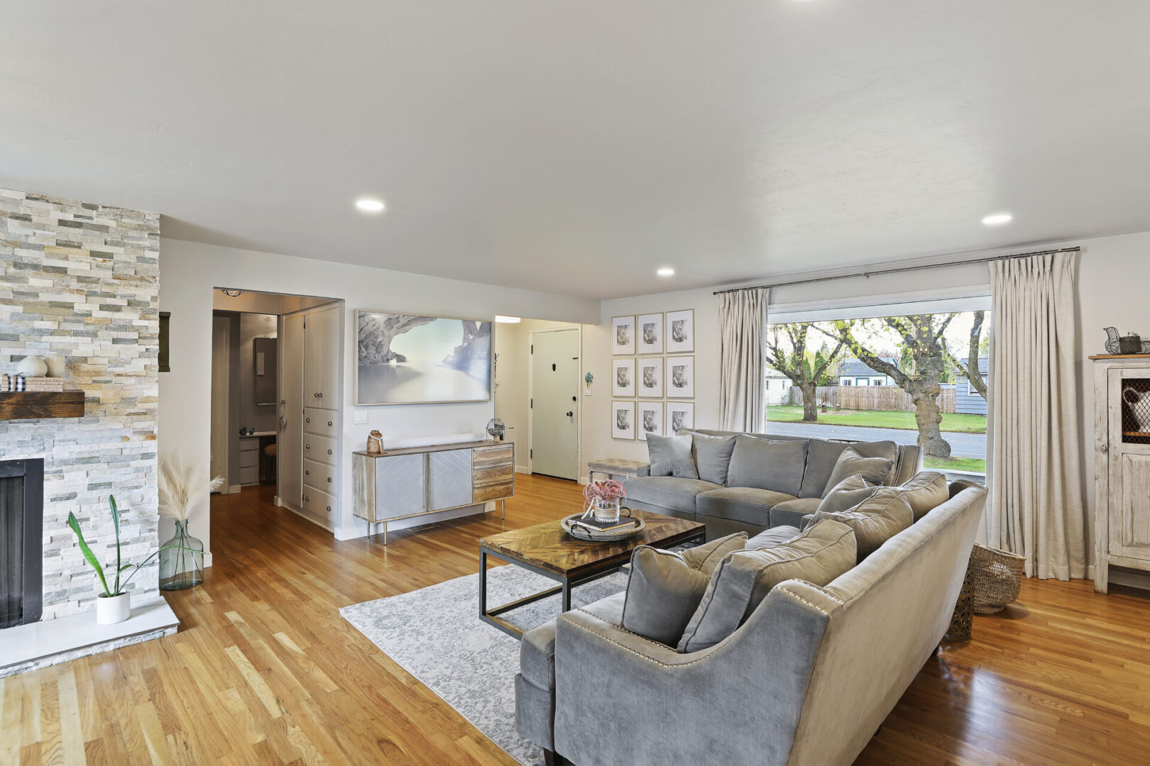 A living room with couches and a table